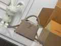 Louis Vuitton Capucines Mini Handbag – Tourterelle Taurillon Leather