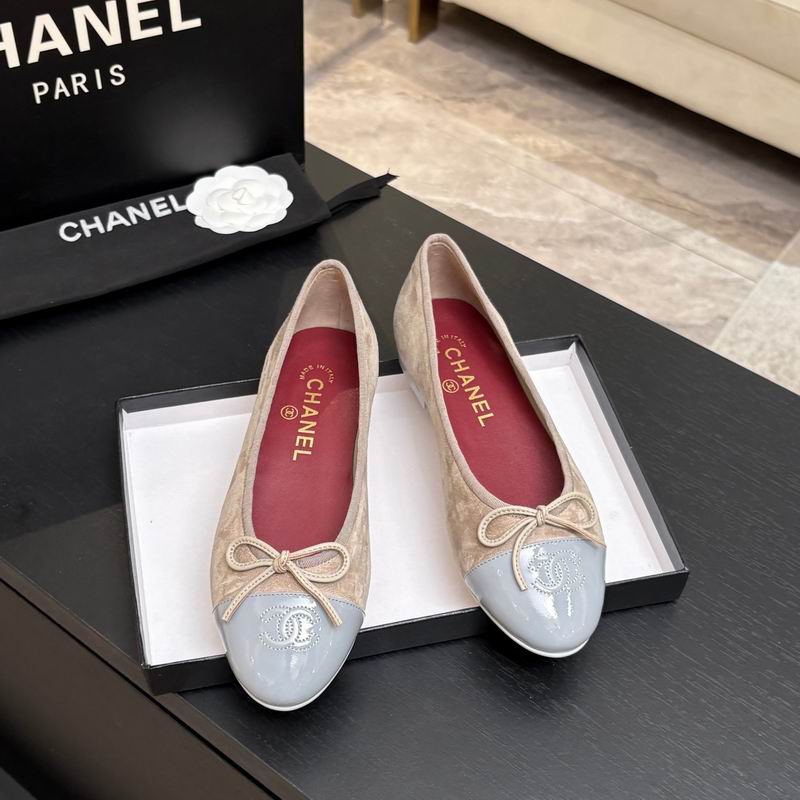 Chanel classic ballet flats in beige quilted fabric with pale blue patent leather cap-toe and gold bow detail, displayed in black Chanel box