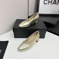 Chanel Gold Metallic Leather Cap-Toe Bow Block Heel Pump