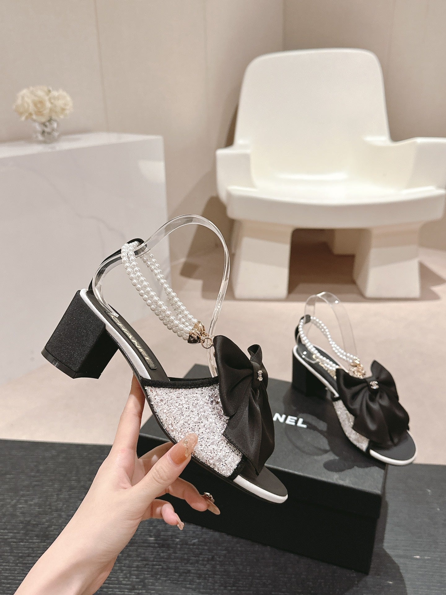 CHANEL HIGH SANDAL WITH PEARL CHAIN BLACK LAMBSKIN WITH WHITE RHINESTONES